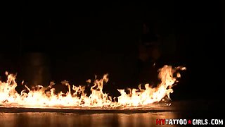 Tattooed Babe Kitten Poses with Fire in a Photoshoot - AltErotic
