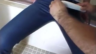 Helping a young woman in wet jeans in the bath