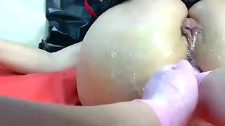 Stretching Out Her Butt Hole With Two Fists