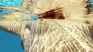 Hot mixed race teen Fernanda Releve swimming naked