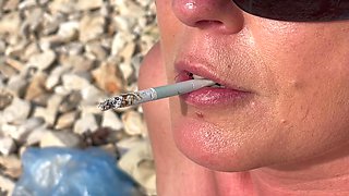 Smoking Cigarettes on the Beach