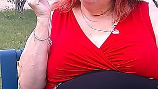 Nurse Vicki Smoking in the Park on a Bench All Dressed up