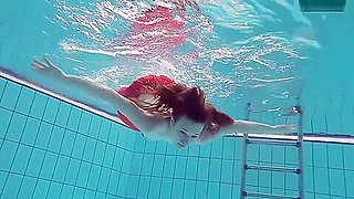 Red Dressed teen 18+ Swimming With Her Eyes Opened
