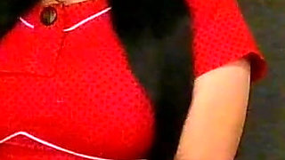 Housewife Smoking in Black Gloves