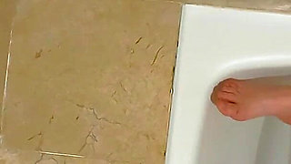 I Recorded My Stepsister Masturbating While Taking a Bath