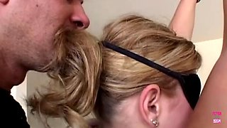 Naughty blonde sucks a big dildo while a guy gives her a hard anal