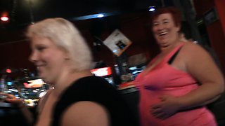 Funny big tits party in the bar