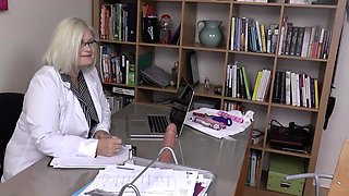 Mature female Doctor helps younger female