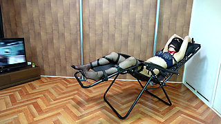 A Woman Is Restrained and Teased with Erotic Lotion