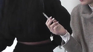 Olga and Natasa Smoking