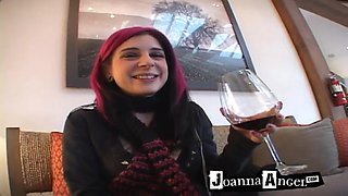 Kinky red-haired senorita drinks a large glass of wine