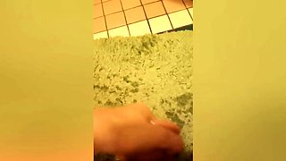 Solo brunette squirts with her huge dildo