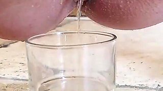 Tattooed Pregnant Brunette Pisses in Glas and the Guy Swallows It