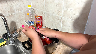 Zara cooks naked in the kitchen