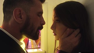 Brunette Izzy Lush in stockings and lingerie, enjoying intimate moments with her partner.