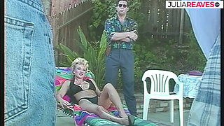 MILF relaxes with a bikini on while the guard watches