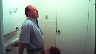 Bathroom slut sucks dick in restroom