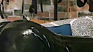 Large Strap-on Gapes Gigi in Latex Catsuit