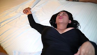 Horny brunette wearing a black sexy dress gets drilled by her lover in bed