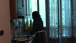 Italian brunette rides a hard big cock in the kitchen