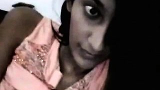Webcam solo with an Indian chick flashing her tits