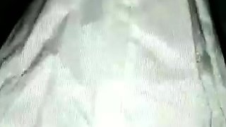 A super sexy brunette massages her big boobs