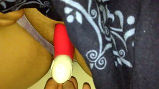 Trying to stuff a sex toy in the pussy of my mature sleeping wife