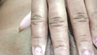 Masturbating