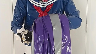 Putting on latex saint priest robe coat and rubber cape over schoolgirl sailor uniform, layers