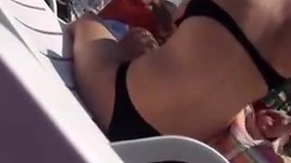Sexy girl with bikini undressing at beach