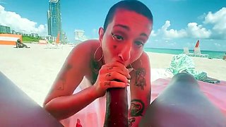 Cum loving tattooed MILF sucks off big black cock outdoors