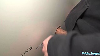 Blondie got curious over a glory hole and enjoyed a dick sticking out of there