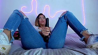 Sexy Blonde Having an Amazing Orgasm with Her Vibrator and Squirting in Her Blue Jeans