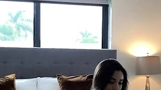 Brunette seductress working her big boobs and hot ass