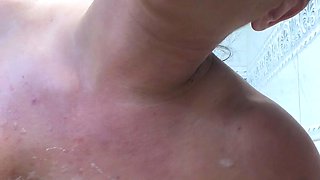 Busty curly brunette with big boobs fucks on couch