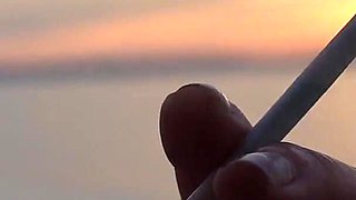 Smoking Cigarettes on the Beach