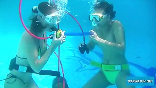 Minnie has fun with Candy underwater