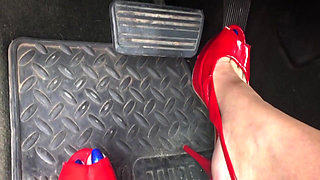 MILF Megan's pedal pumping in sexy red high heels