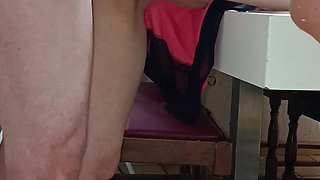 Woman getting caught on the table