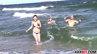 Spring break friends sharing a knob