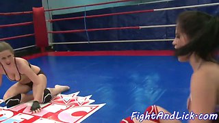 Busty beauties grappling before lesbian act