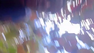A black man fucks a juicy Cuban woman with fake big tits on jetski