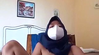 Hijab After Work Horny Plugging Vagina with Vibrator