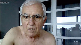 French silver fox delivers a hand-job show on cam