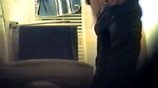 Girl using the toilet and filmed by voyeur 2