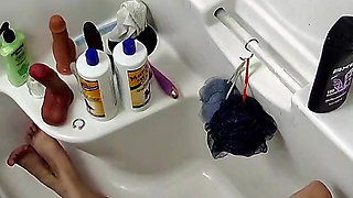 Pawg milf toys pussy in the shower