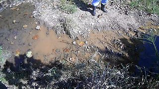 Mountainmama Playing in Creek