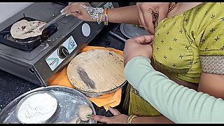 Indian aunty Kavitha Raj cooking while her husband is away, gets into some raunchy cowgirl action with her big natural tits