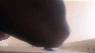 High-Heeled Milf Sucks and Fucks in a Catsuit at a Gloryhole