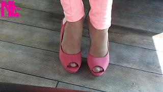Shoeplay with High Heels in a Bar